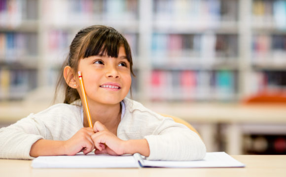 Child with Cystic Fibrosis in Classroom at School