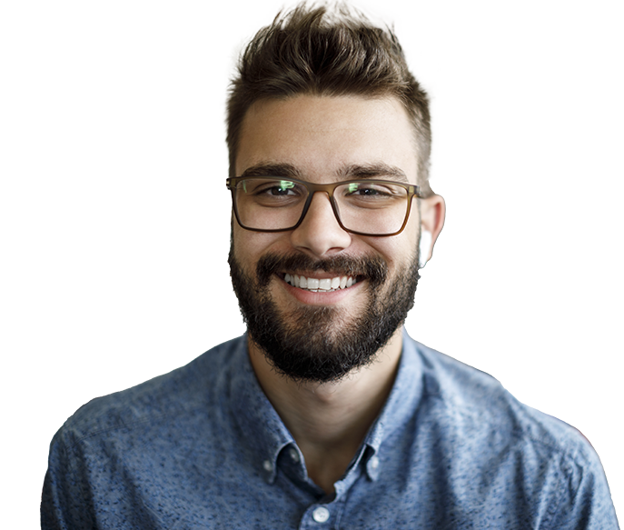 Young man smiling with glasses and denim shirt