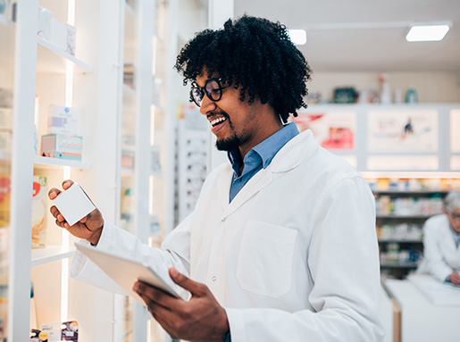 Pharmacy tech checking prescriptions