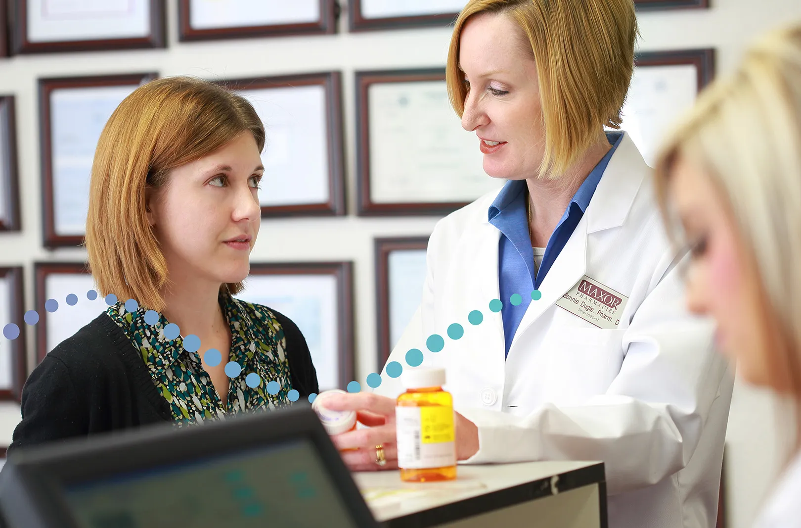 Pharmacist discussing medication.